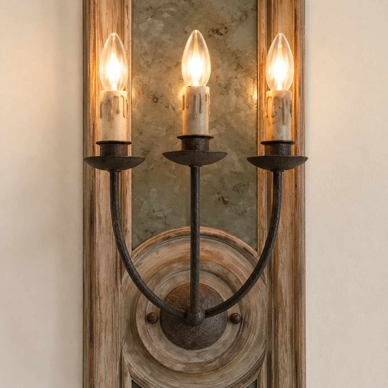 Close detail of Maren three iron candle-style sockets