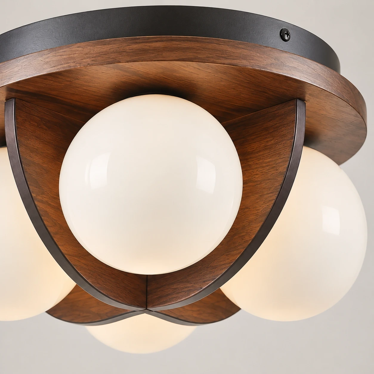 Close view of the walnut wood and metal body and wood accent