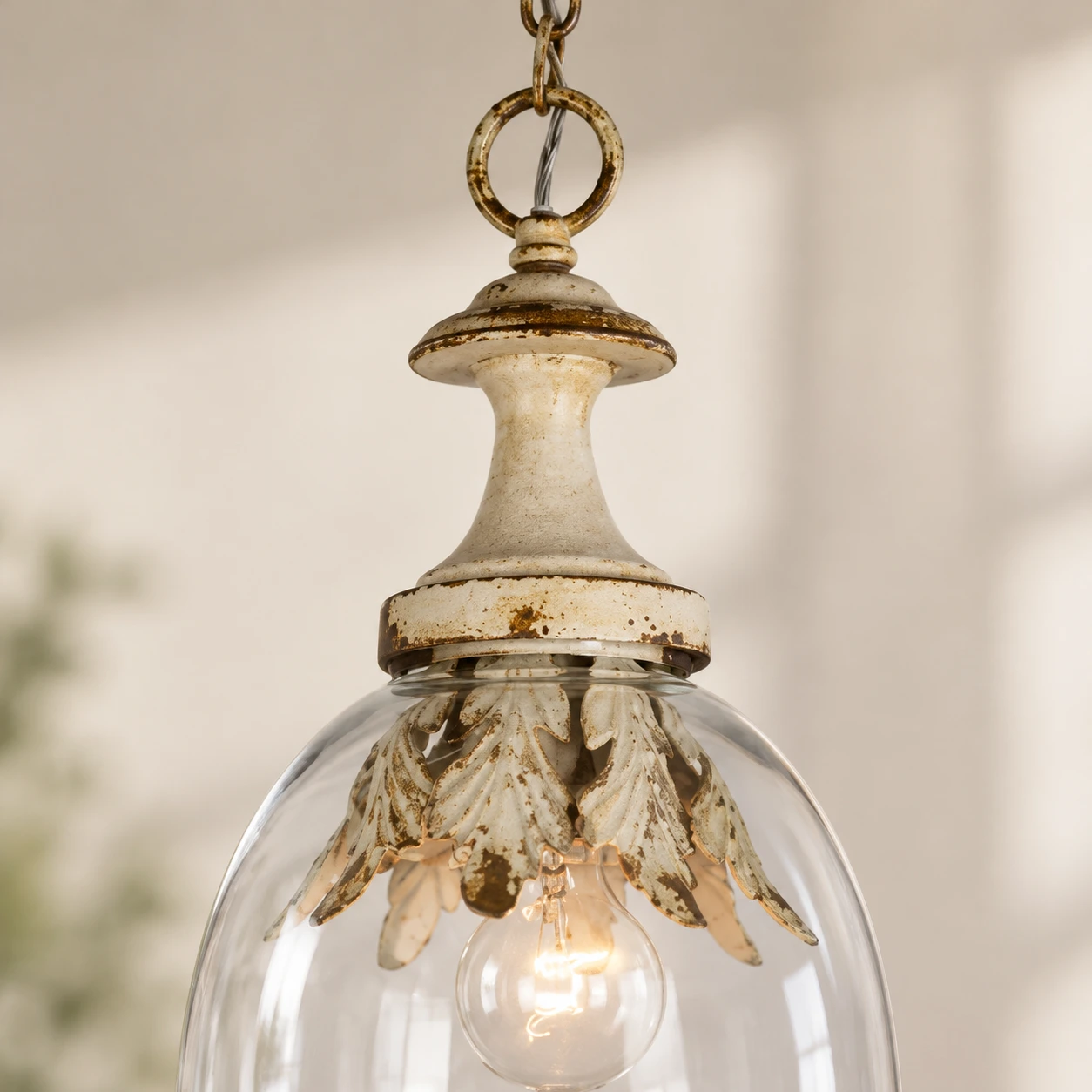 Distressed iron cap and chain detail