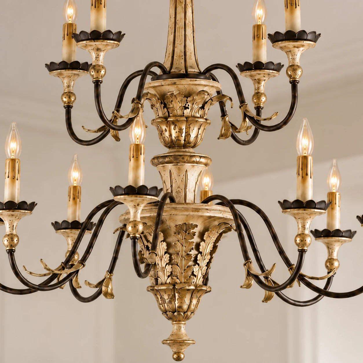 Close detail of the Aurelia Vintage Double-Tier Gold-Leaf Carved Wood Chandelier carved wood center column