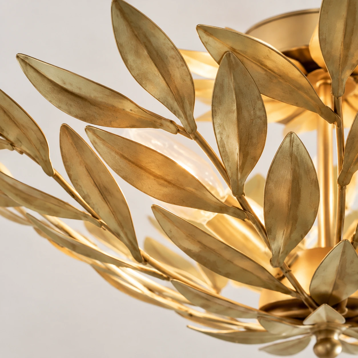 Close view of antique golden iron leaves and branching stems