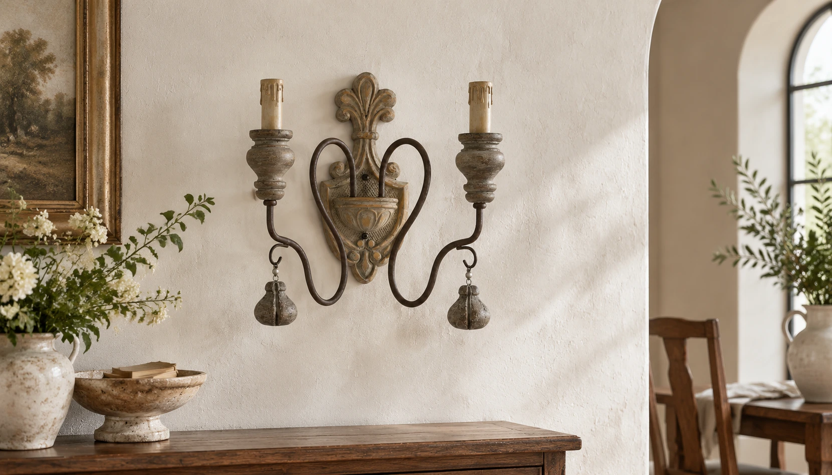 Mara Rustic Double-Arm Wood & Iron Wall Sconce installed on a neutral plaster wall