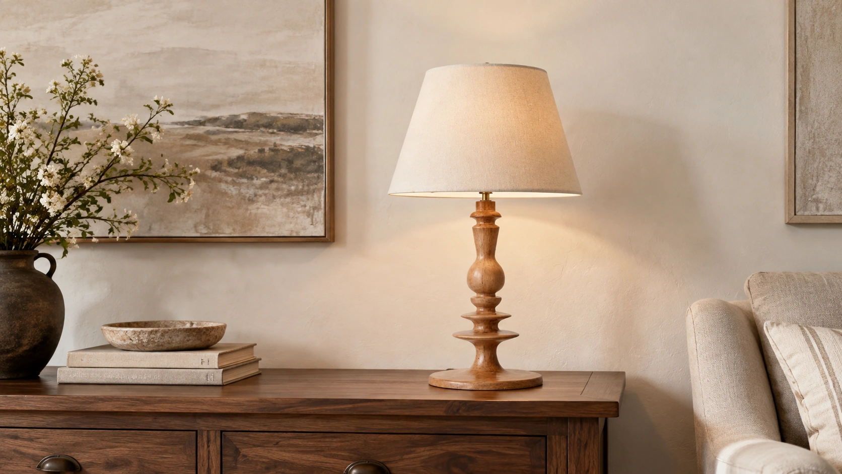 Rustic wooden table lamp on a walnut console