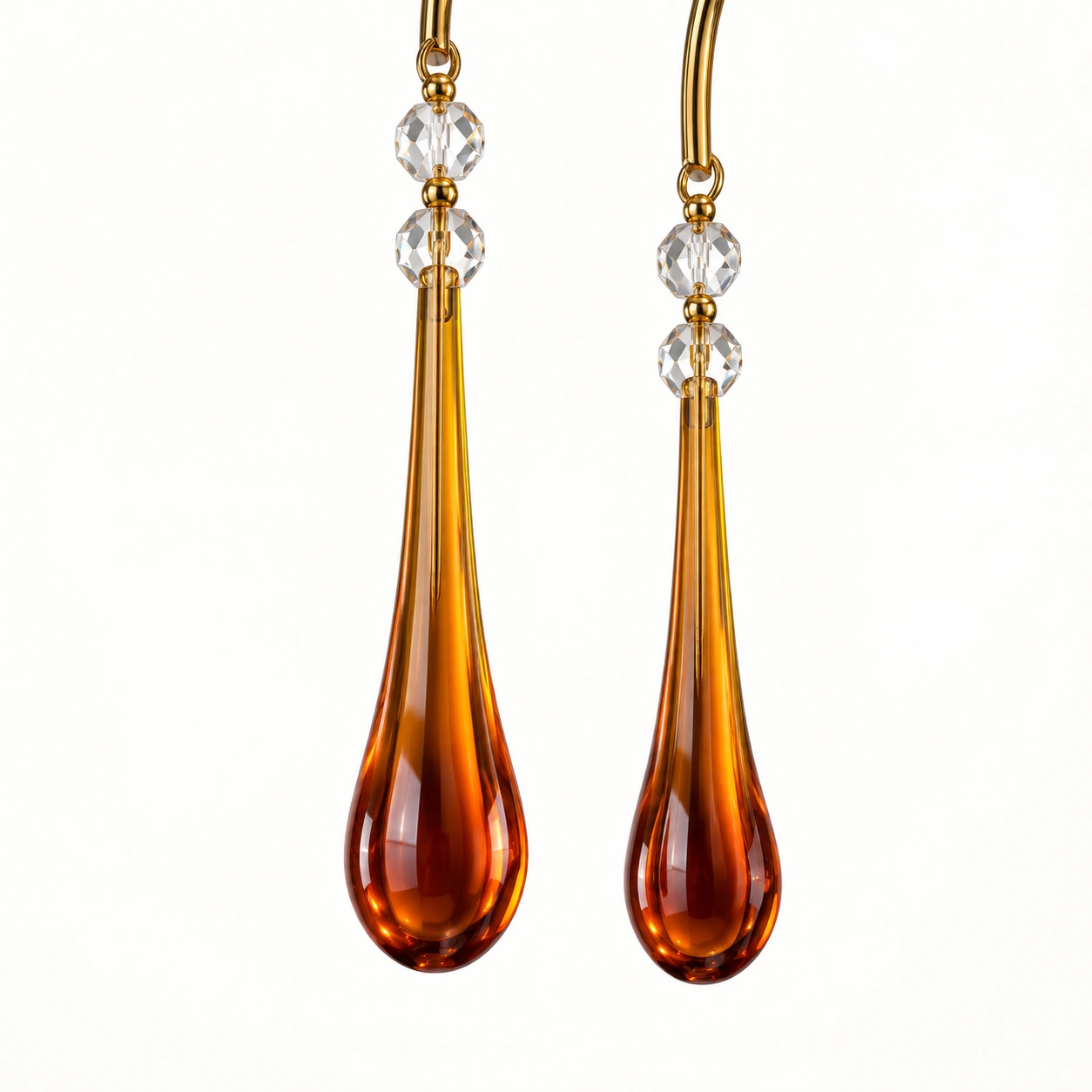 Close detail of amber teardrop glass and clear bead accents