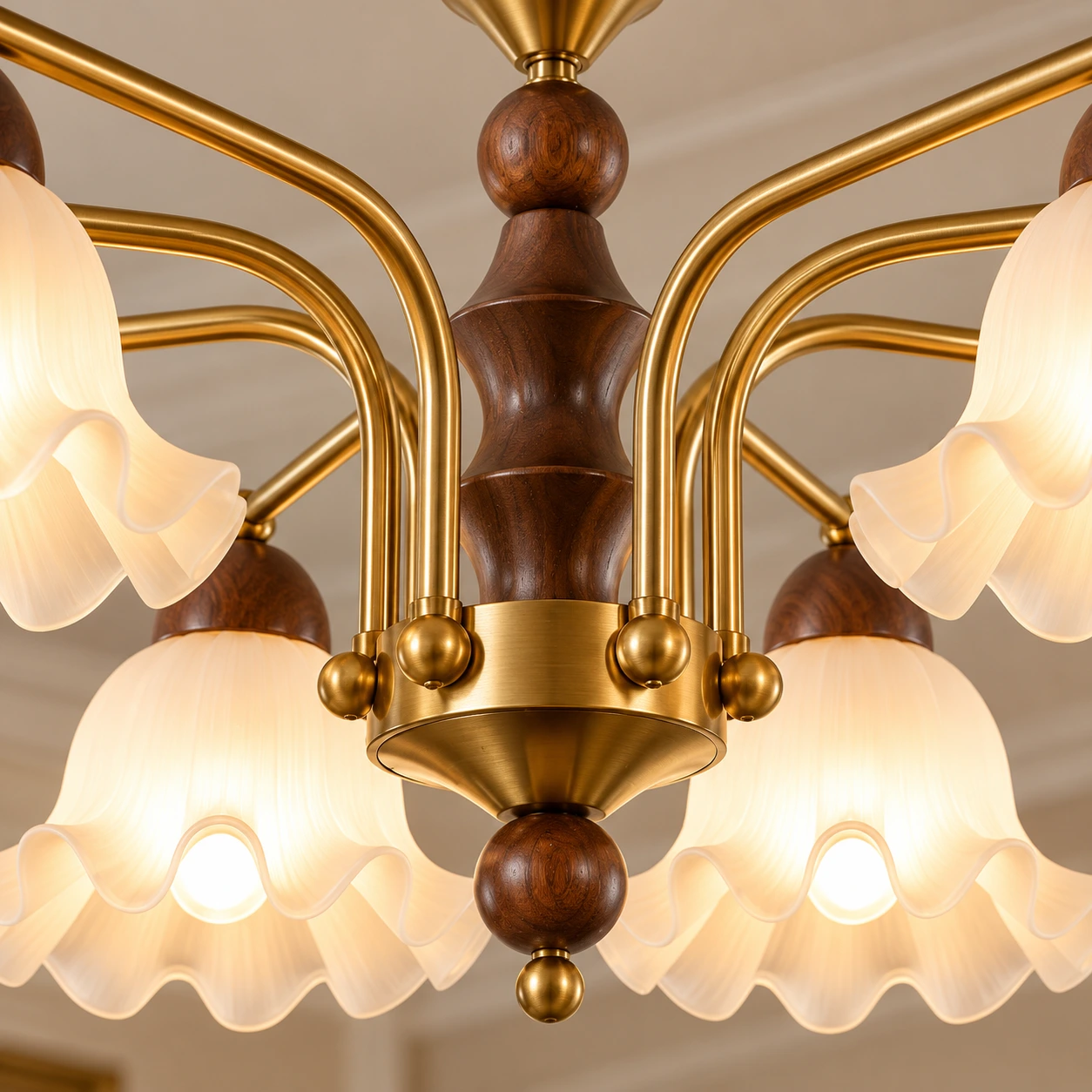 Close view of the walnut-toned center and metal arms
