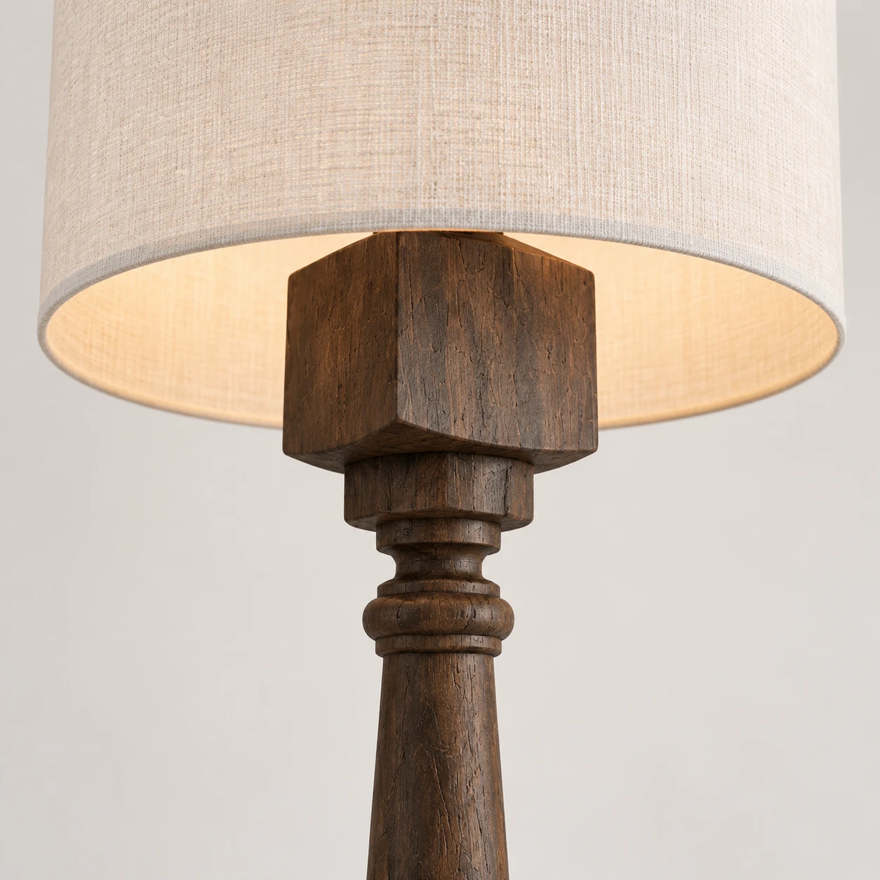 The softly lit shade above Dark Wood detailing