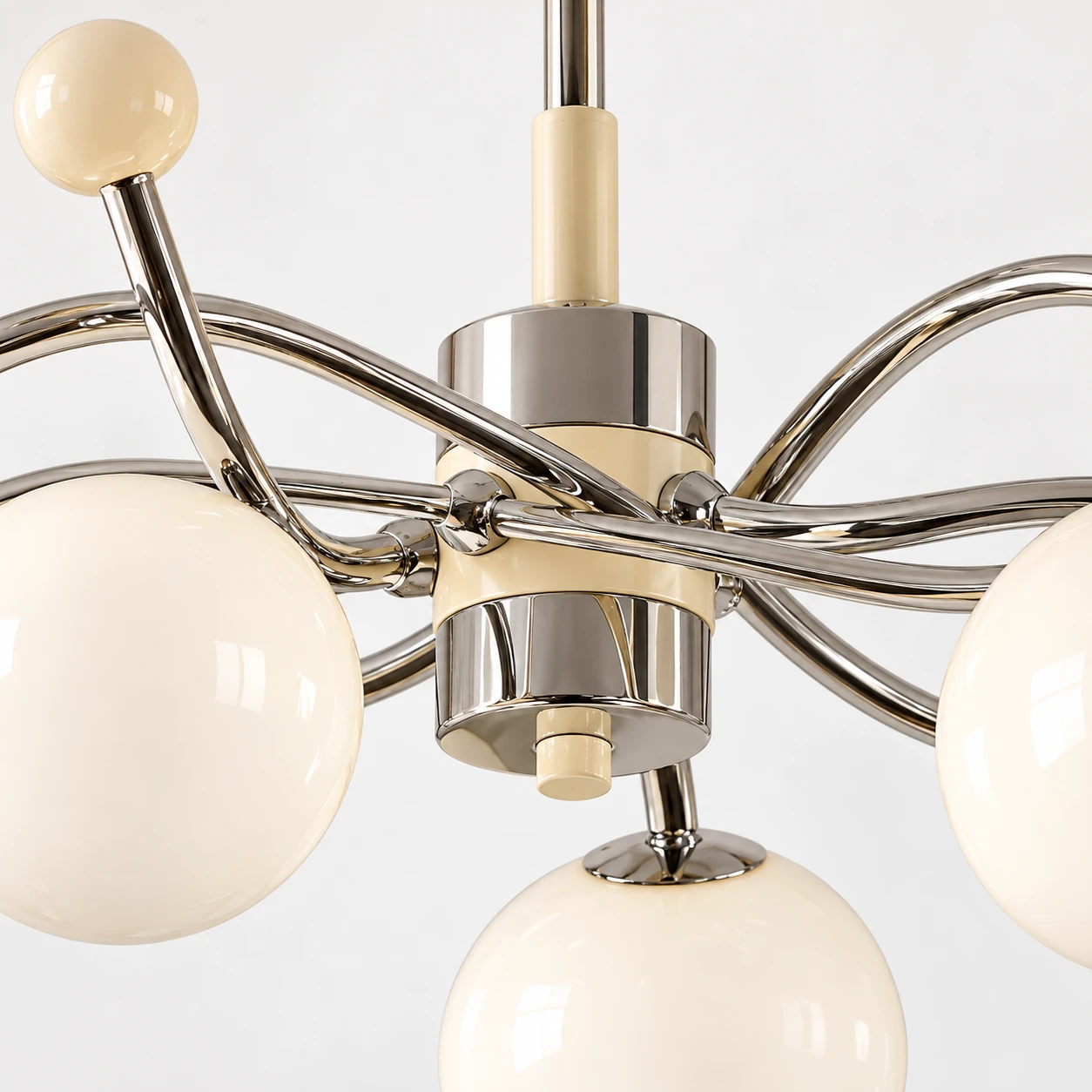 Central iron hub with curved arm connections