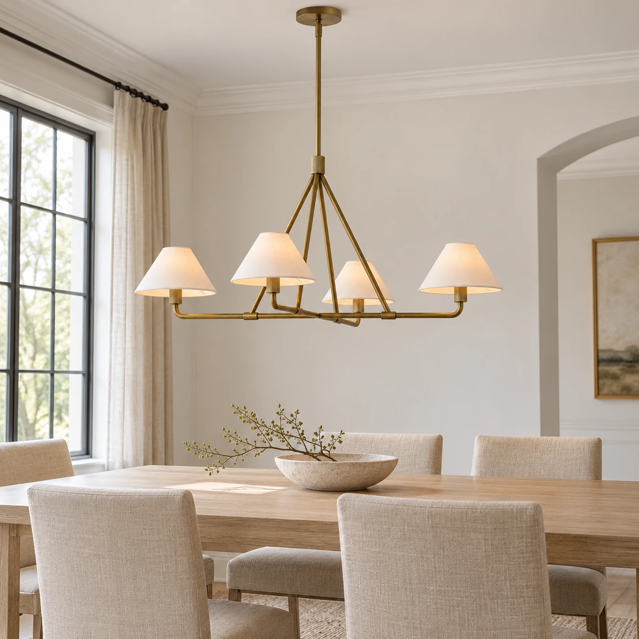 4-Light gold Maren chandelier over a dining table