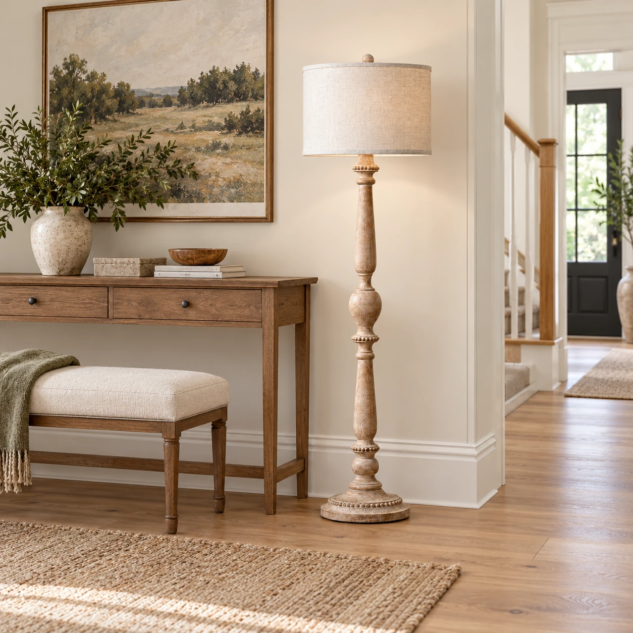 Floor lamp beside an entry console