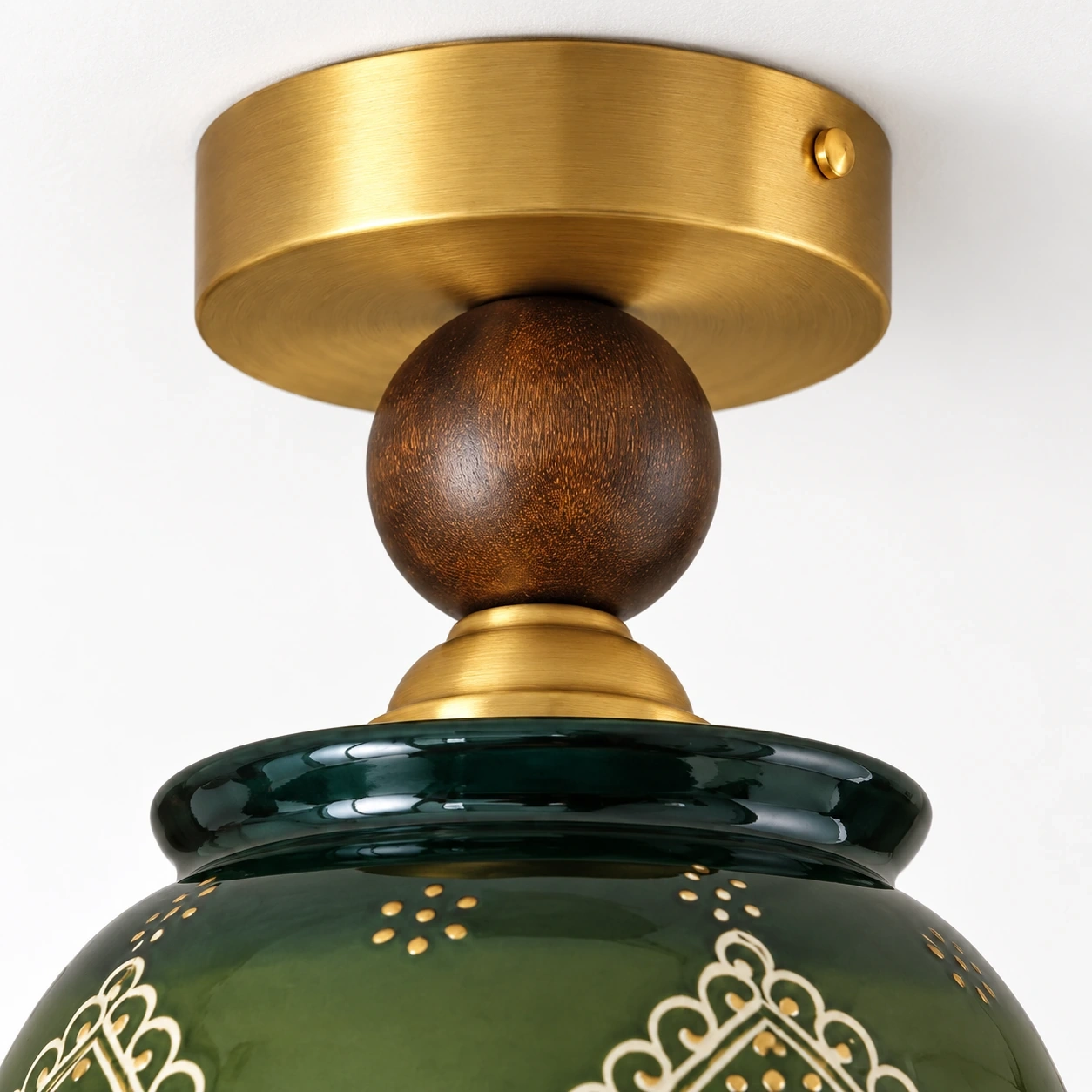 Gold-tone canopy and dark wood ball connector