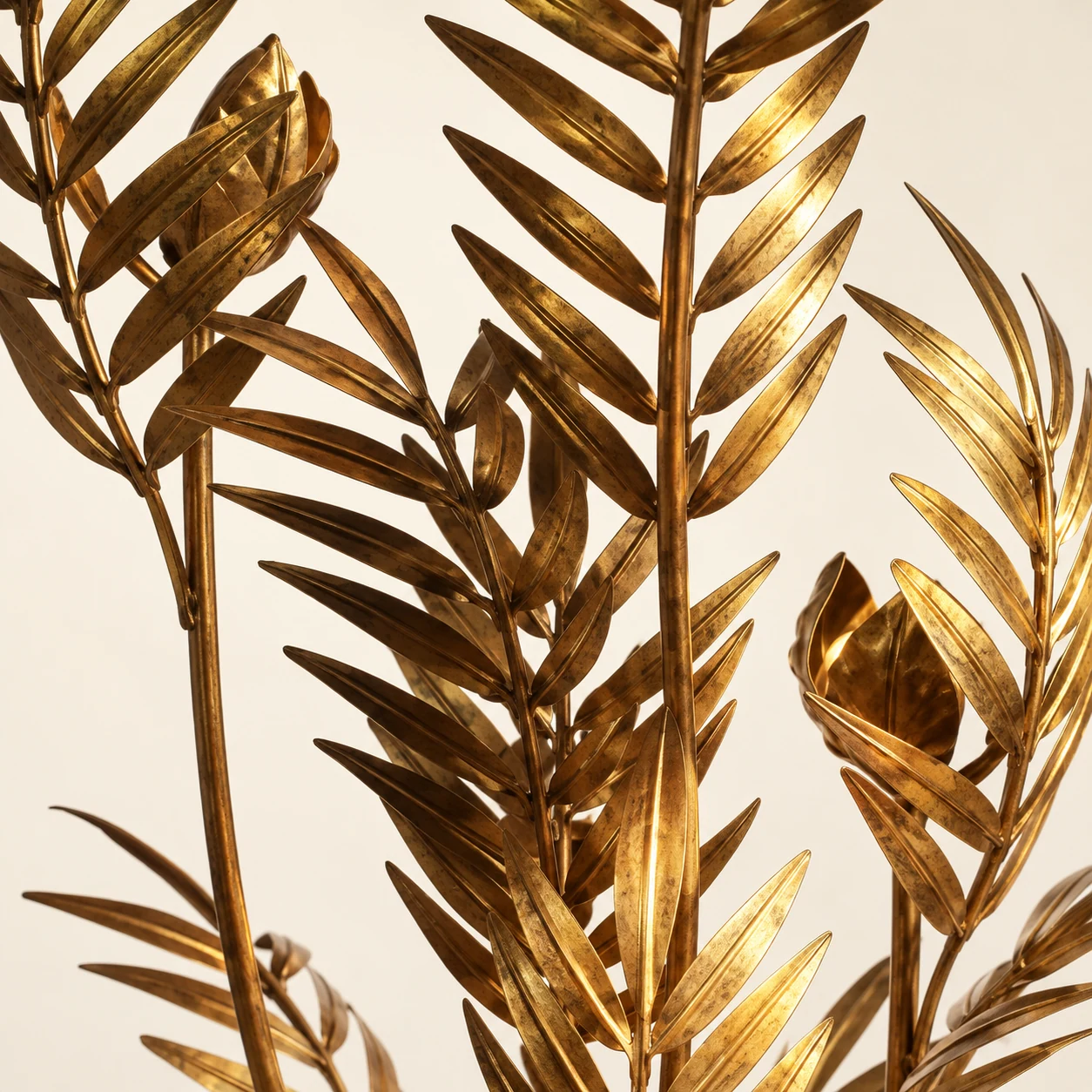 Close detail of iron palm leaf texture on the Liora floor lamp