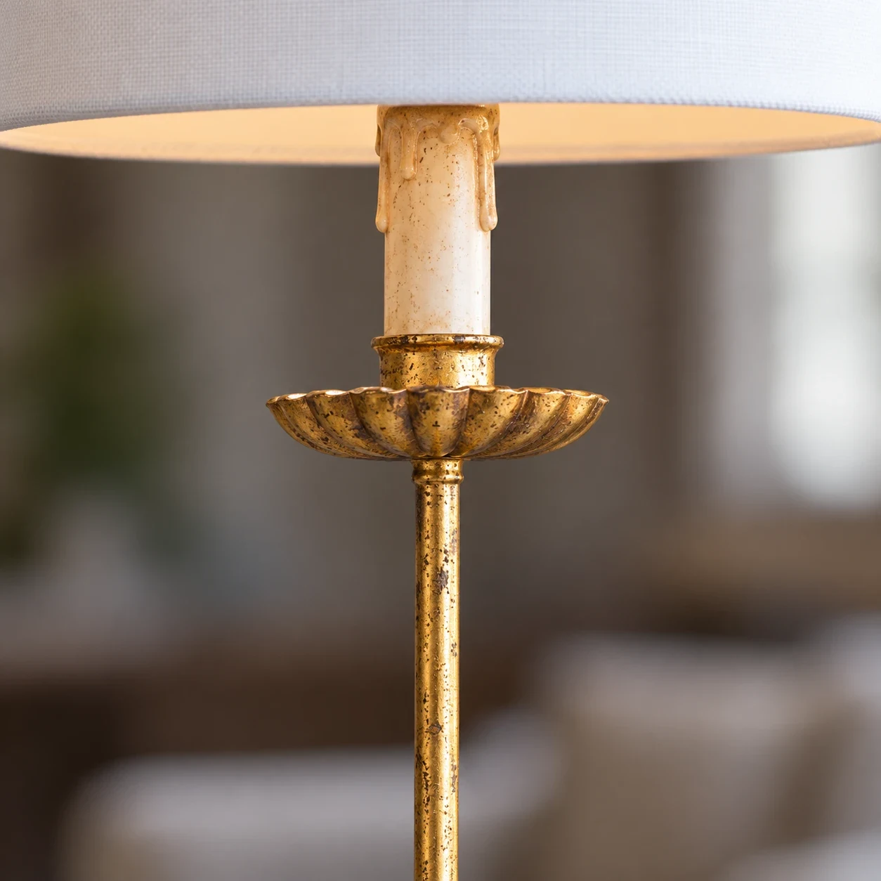 Close-up of candle cup and slender stem