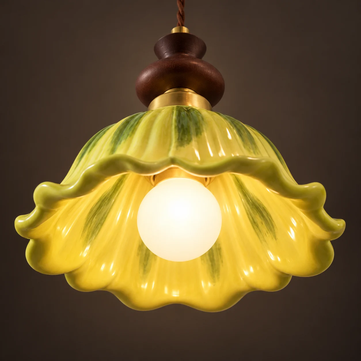 Underside warm glow of the ceramic shade