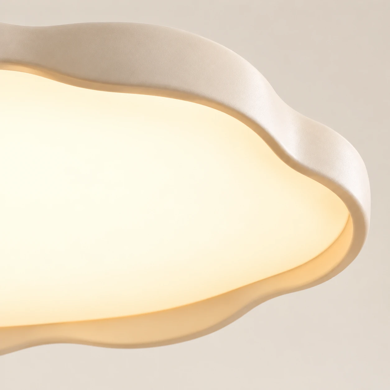 Close detail of the cream wavy acrylic diffuser