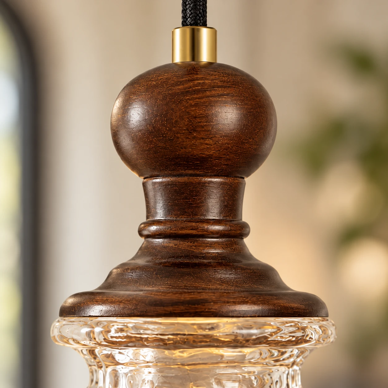 Walnut wood stem and brass cord connector detail